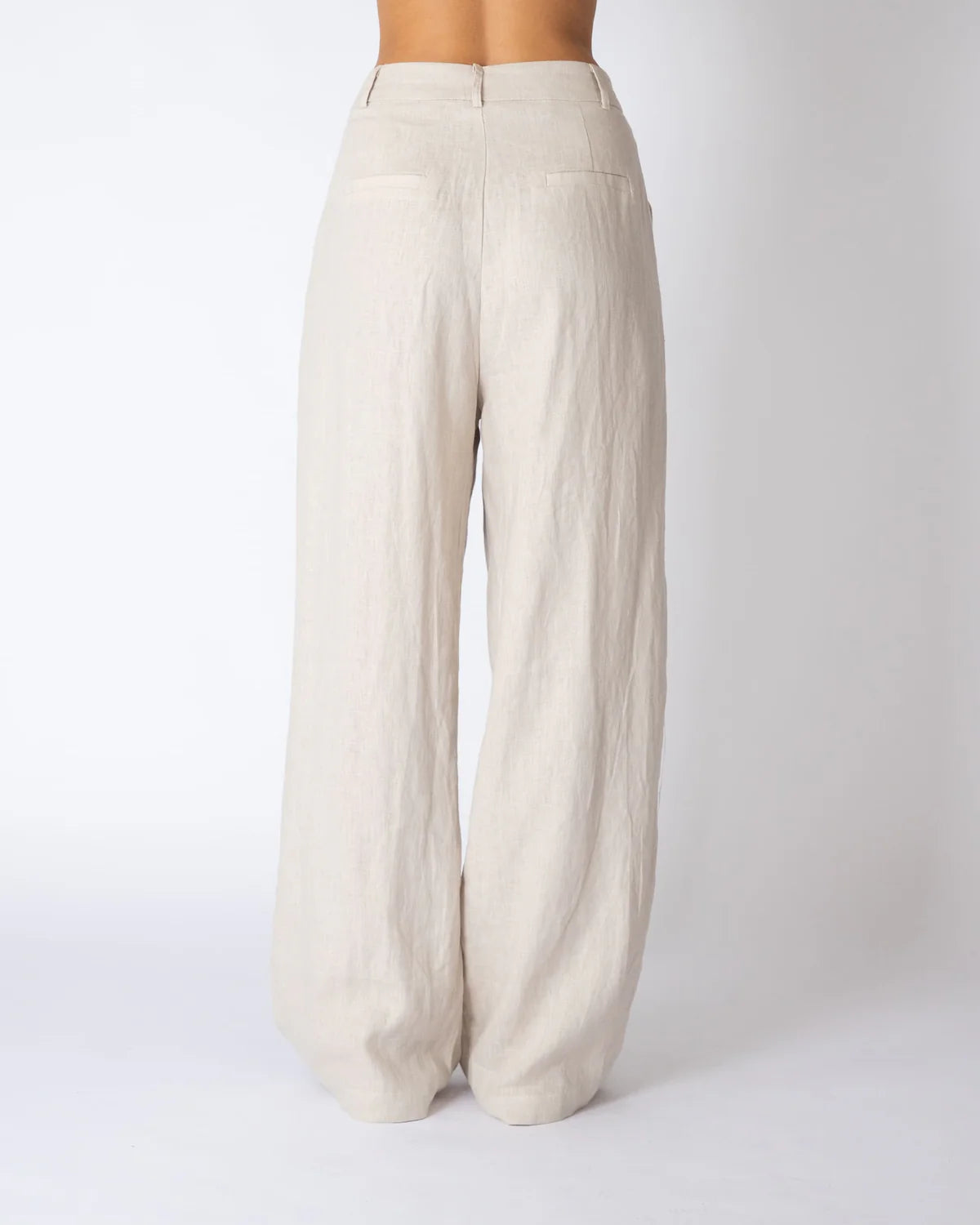 Beige wide-leg pants on a white background